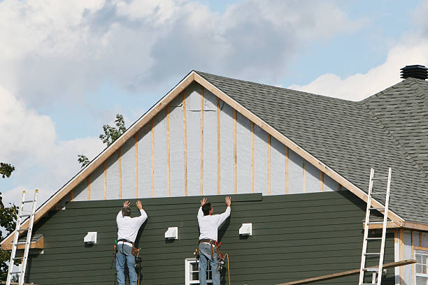 Professional Siding technician working in New Freeport, PA
